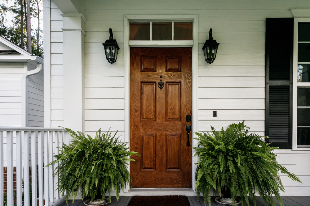 Brown wood fiberglass door- Rolox Home Service LLC
