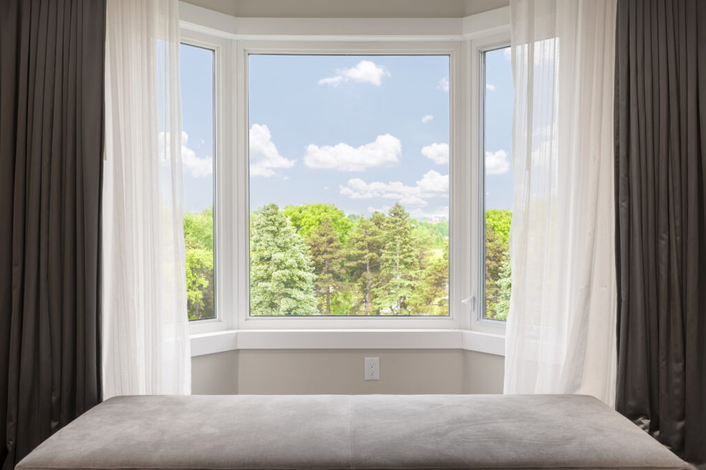 Bay Window with Trees in Window | Rolox Home Service, LLC.