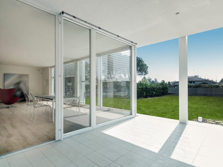 image of a house with glass sliding doors